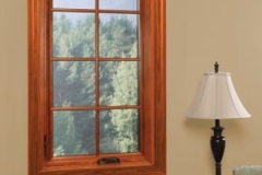 Closed casement window next to lamp