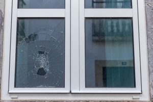 Broken left window and undamaged right window